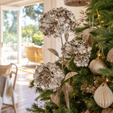 Champagne Triple-Head Floral Stem on a decorated Christmas tree