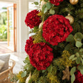 Red Metallic Flower Bouquet Stem on a decorated Christmas tree
