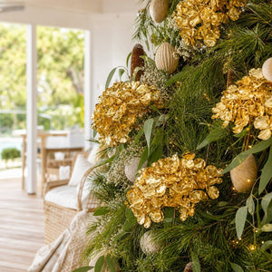 Gold Metallic Flower Bouquet Stem on a decorated Christmas tree