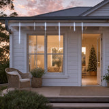 LED Rainfall Tube Lights Cool White (4.8m) styled in an Australian Christmas setting