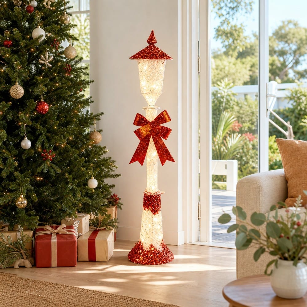 LED Twinkling Glitter Street Lamp Red (1.2m) beside a decorated Christmas tree in an Australian living room